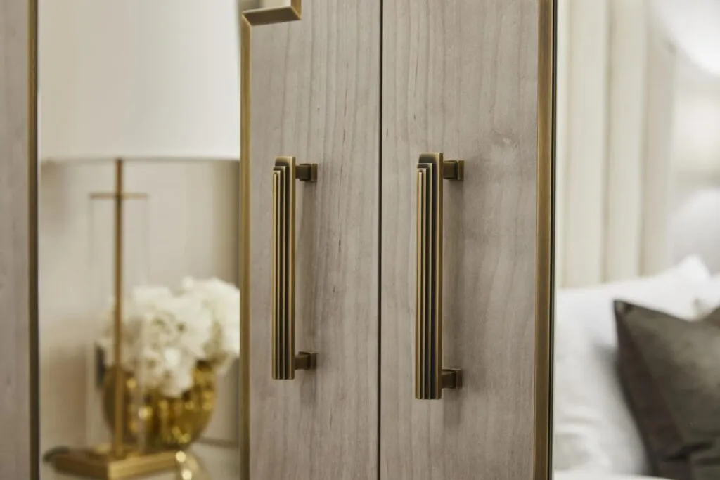 Bespoke oak wardrobe with brass handles – Italian joinery by Paolo Rota Interiors
