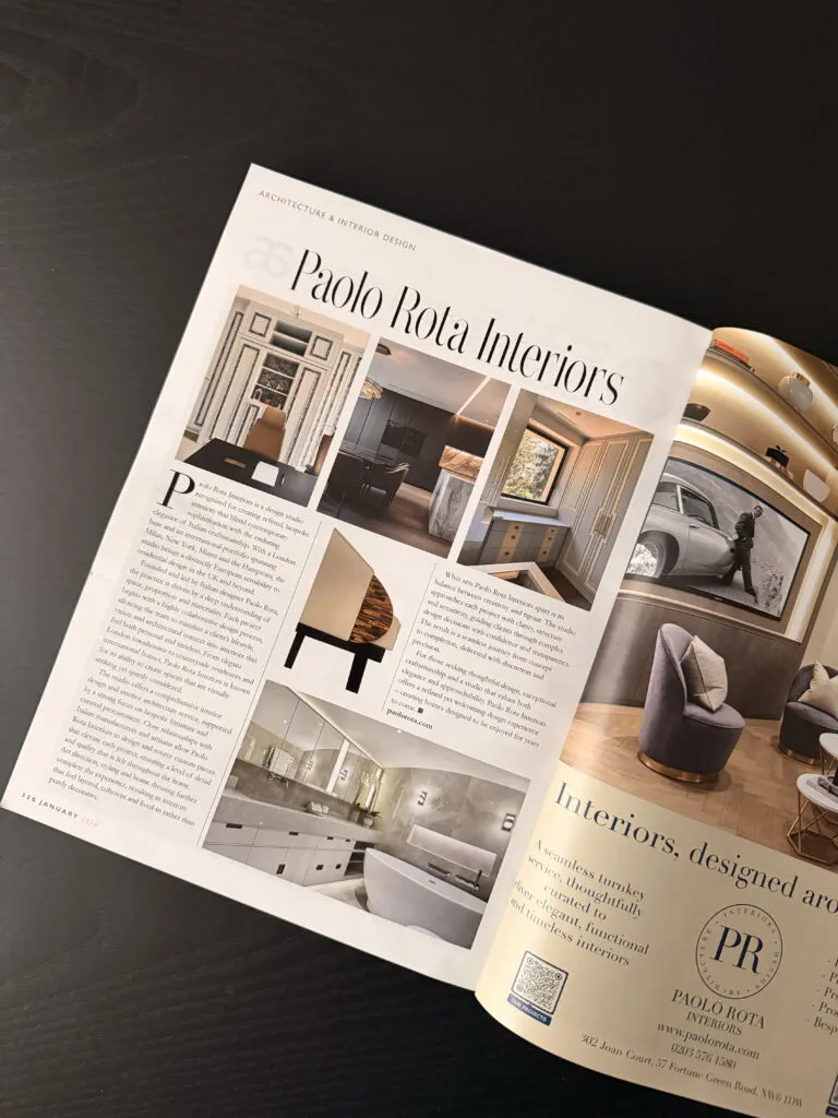 A two-page editorial feature in Hampstead Life & Highgate magazine titled "Paolo Rota Interiors," showcasing a portfolio of luxury interior design projects including a bespoke home office, a modern bathroom with a freestanding tub, and a refined kitchen space.
