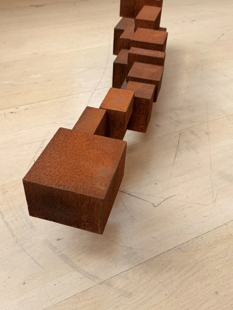 Antony Gormley cast iron sculpture for modern art bespoke interiors at Phillips London