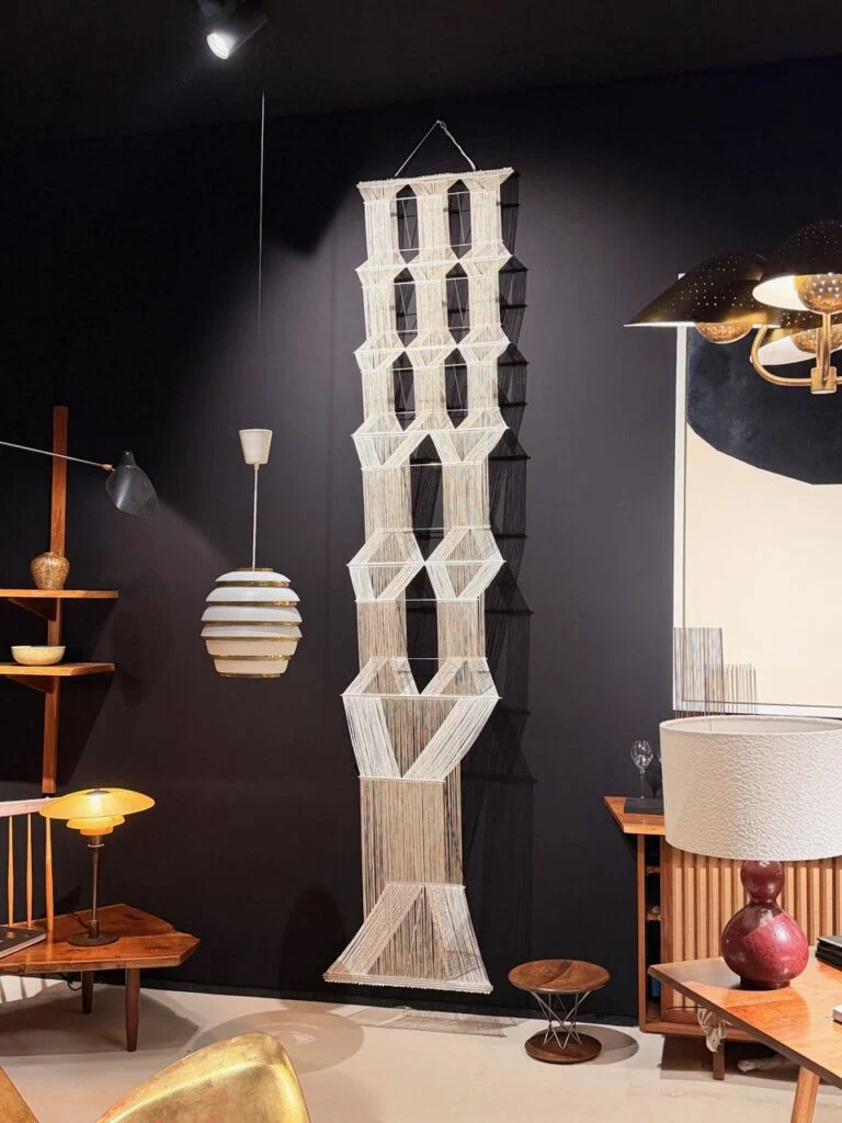 Suspended architectural geometric macramé woven textile sculpture at PAD London