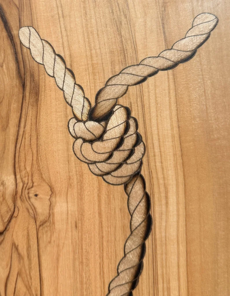 Intricate wood-inlay rope detail crafted by Italian artisans, inspiring bespoke joinery for an interior designer in London and Milan