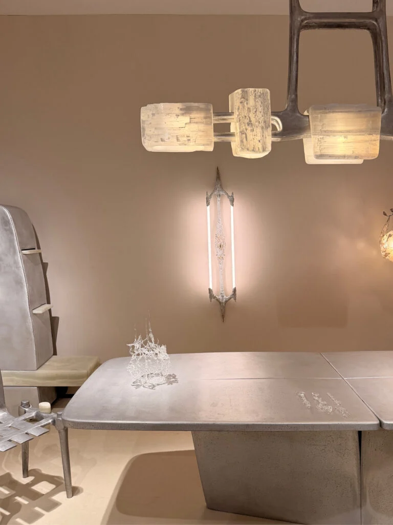 Brutalist cast metal dining table and selenite lighting suite at Galerie Boketto, PAD London